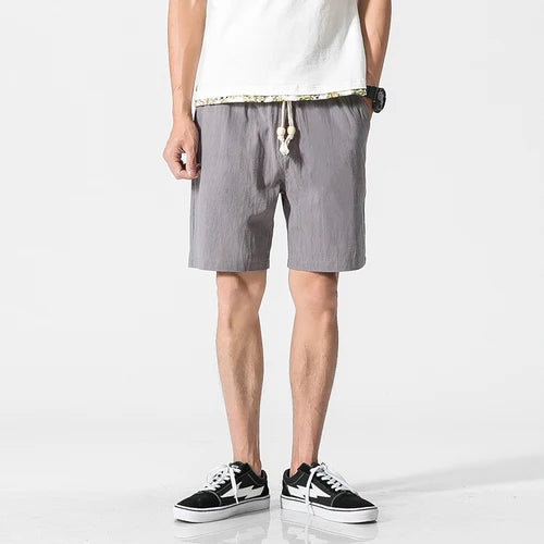 LOY Men's cotton linen casual shorts featuring breathable fabric and a relaxed fit, ideal for summer wear.
