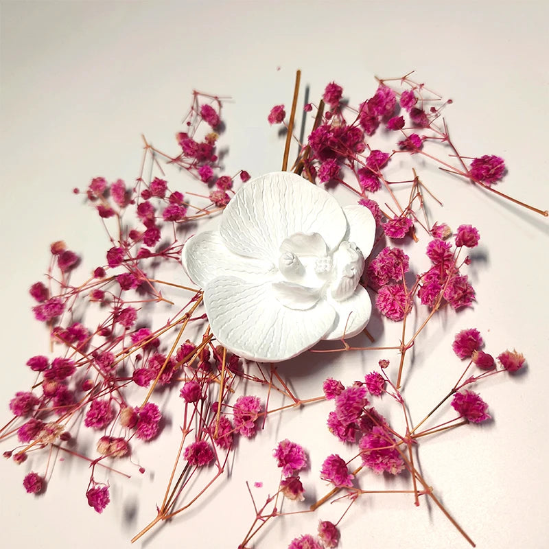 Aromeasy ceramic aromatherapy air freshener diffuser with ribbon from LOY Home Decor, featuring a sleek ceramic design and decorative ribbon.