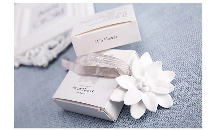 LOY Home Decor Ceramic aroma diffuser with ribbon, aromatherapy air freshener, elegant design for enhancing home fragrance.