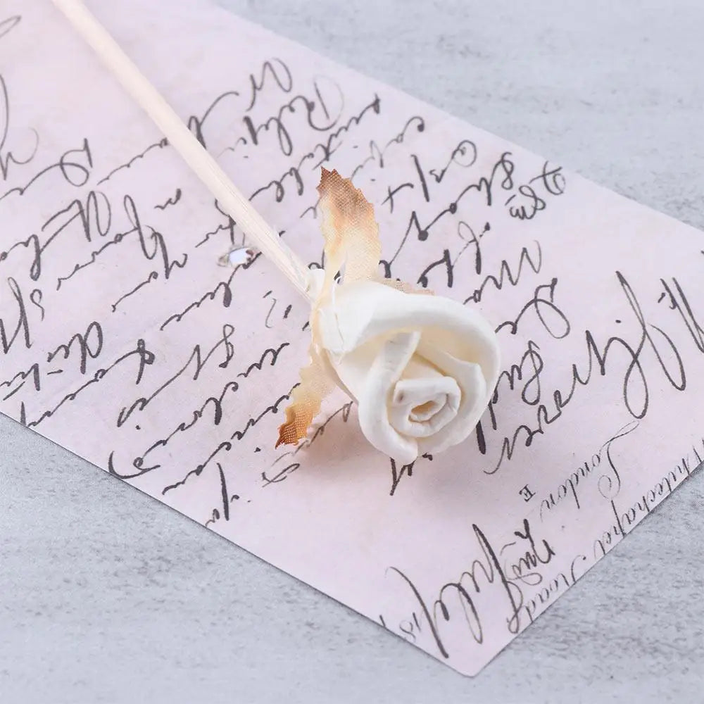 LOY Floral Aroma Oil Diffuser with decorative artificial flowers, designed for home scenting and aesthetic appeal.