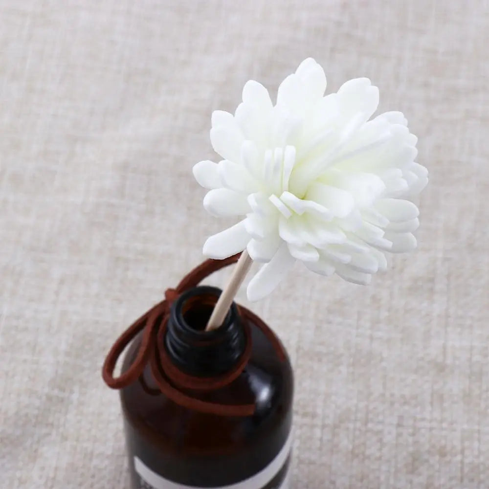 LOY Floral Aroma Oil Diffuser with decorative artificial flowers, showcasing a stylish scent diffuser for home decor.