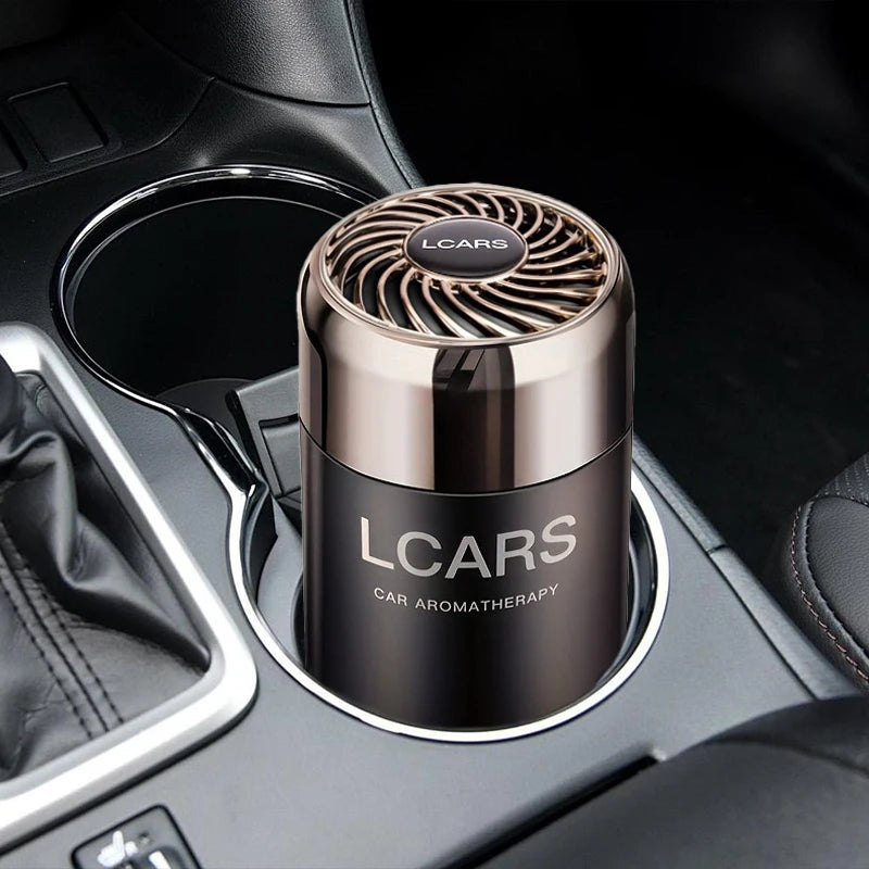 LOY Car Odor-Eliminating Aromatherapy diffuser with fresh drive scent, shown in a sleek black bottle with aromatic reeds.