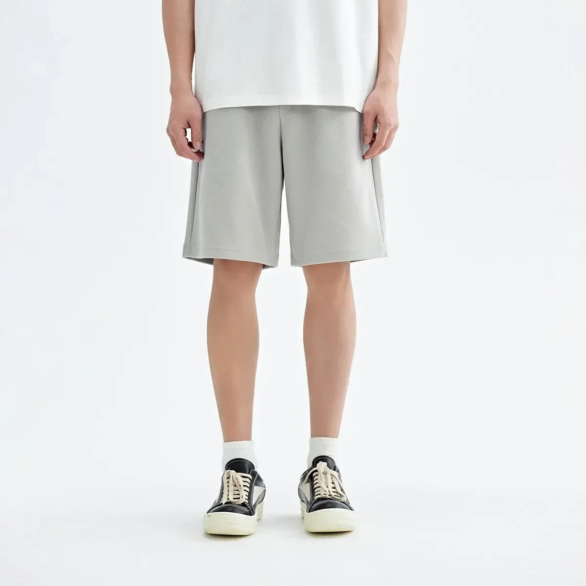 LOY Men's graphic print shorts with playful design, casual style, featuring bold artwork and comfortable fit.